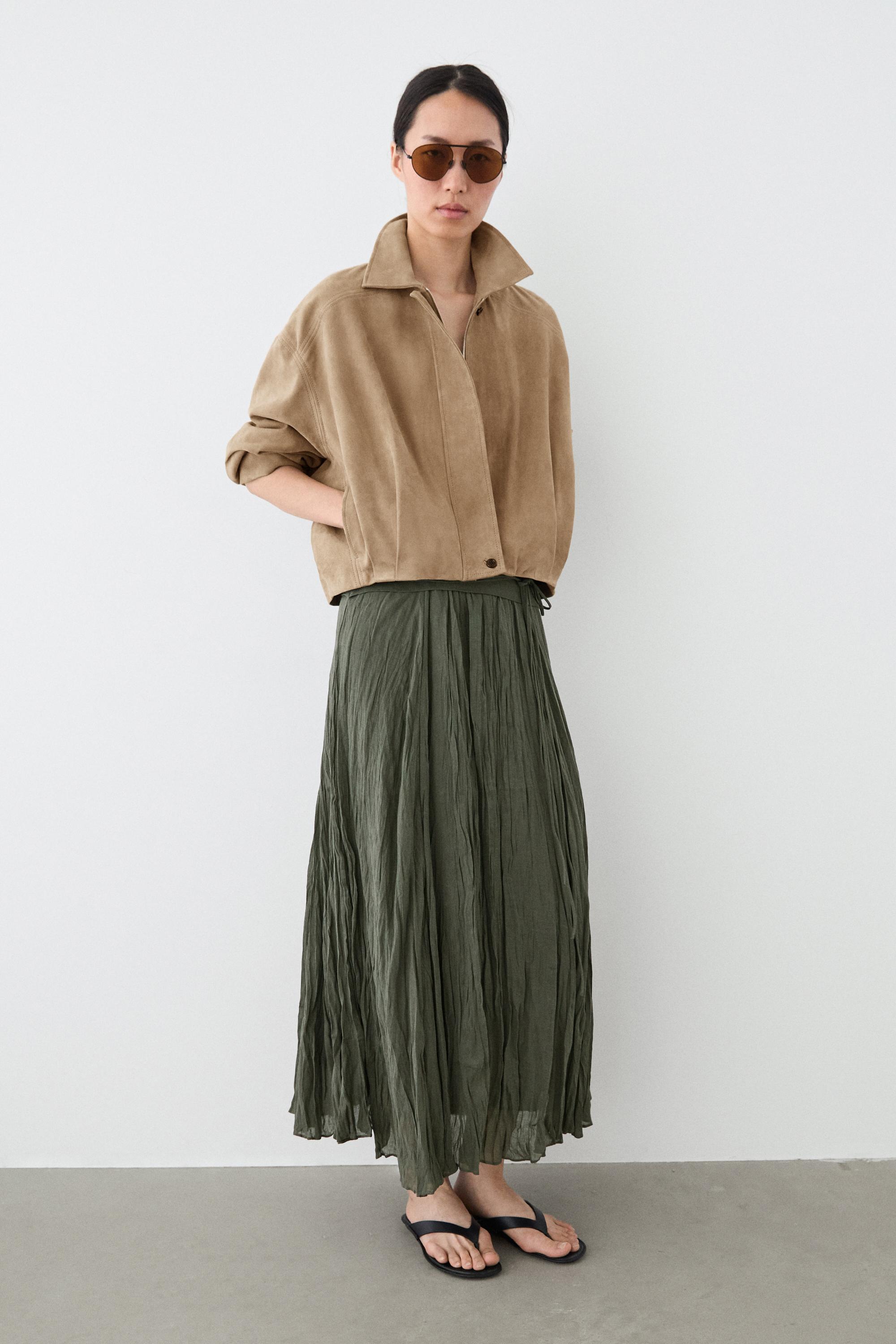 Blouson bomber plissé en cuir et daim